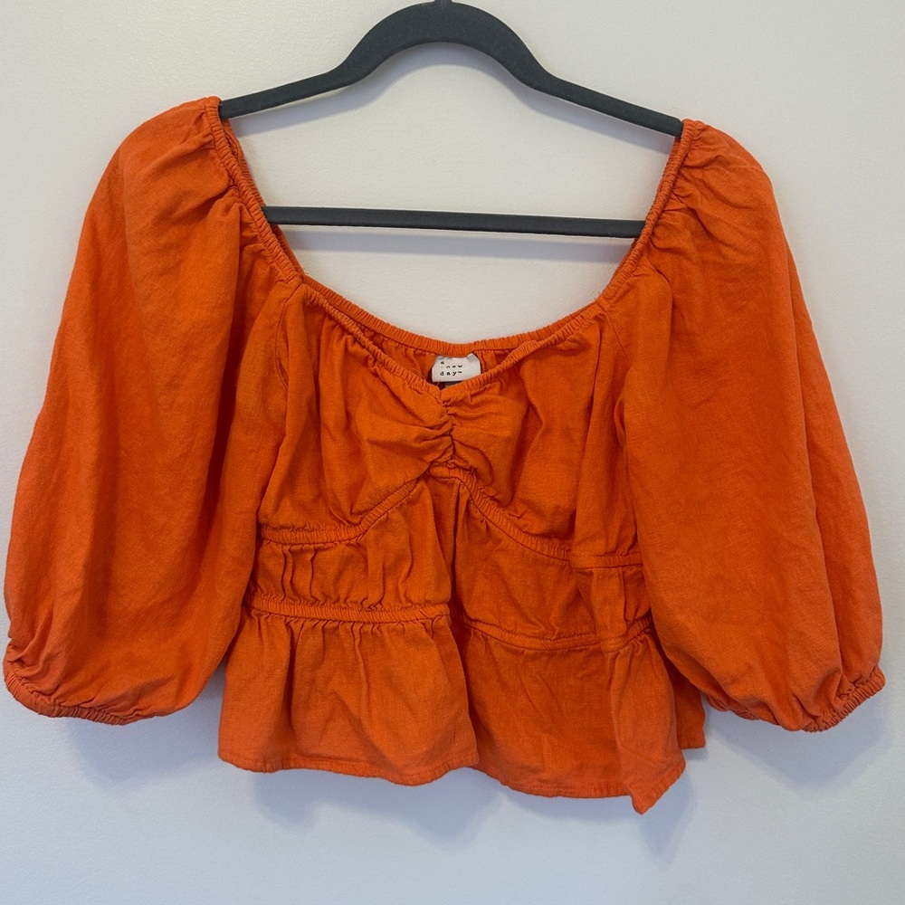 Orange peasant top